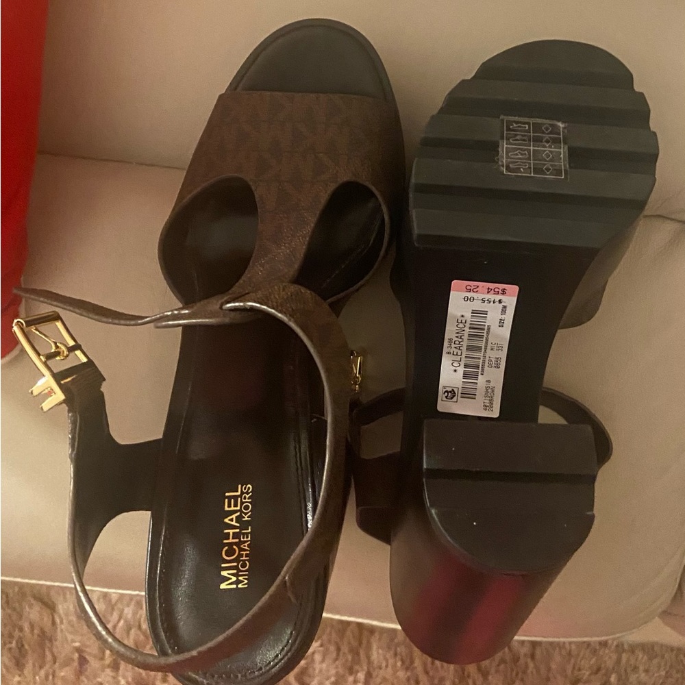 Size 10 Michael Kors shoes. Never worn- purchased from Dillards.